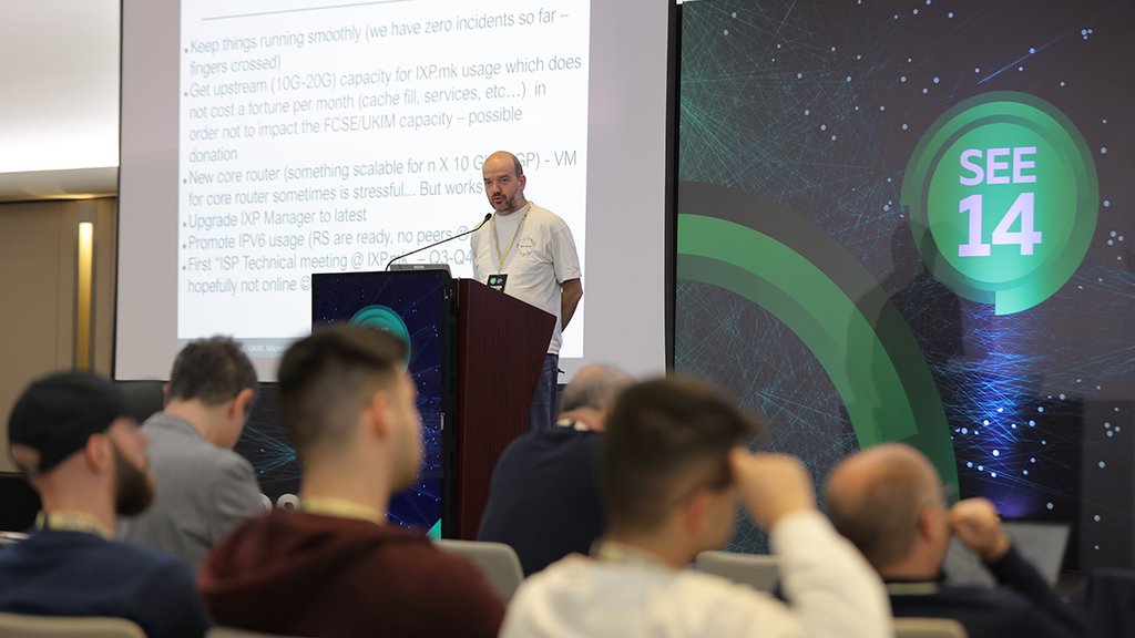 A picture of Vladislav Bidikov giving a presentation