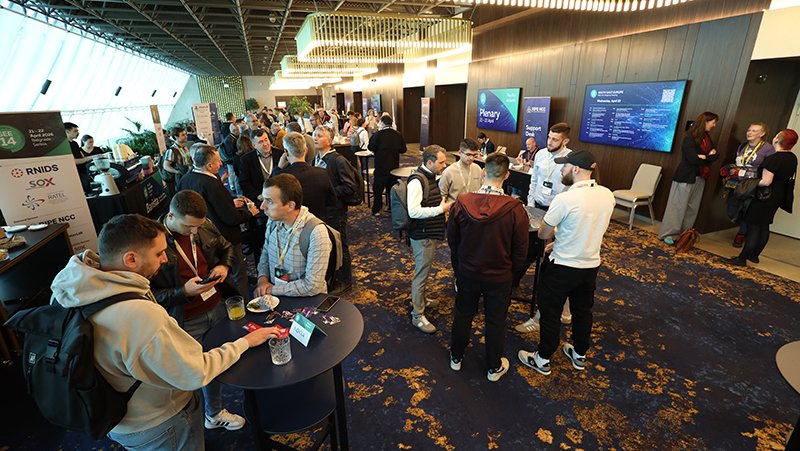 A picture of event attendees networking