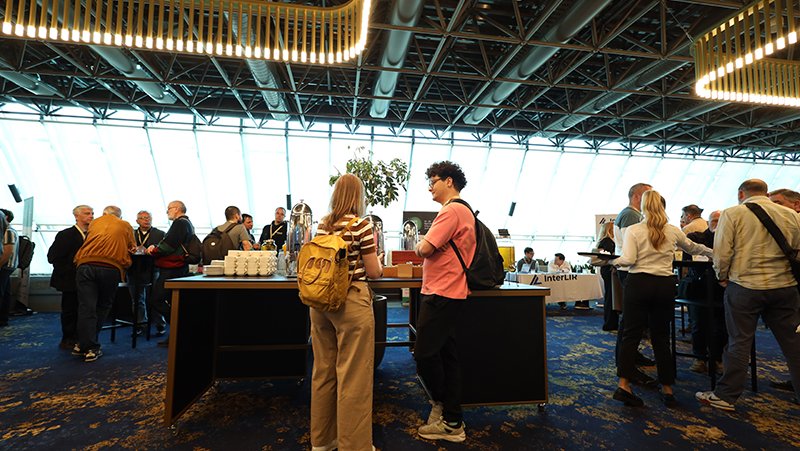 A picture of event attendees networking