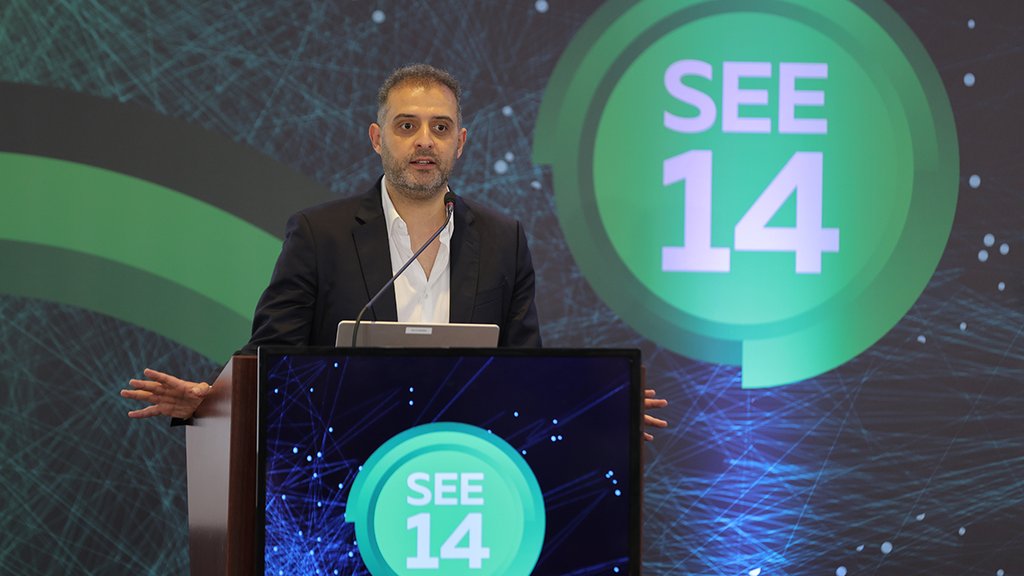 A picture of Hisham Ibrahim giving a presentation