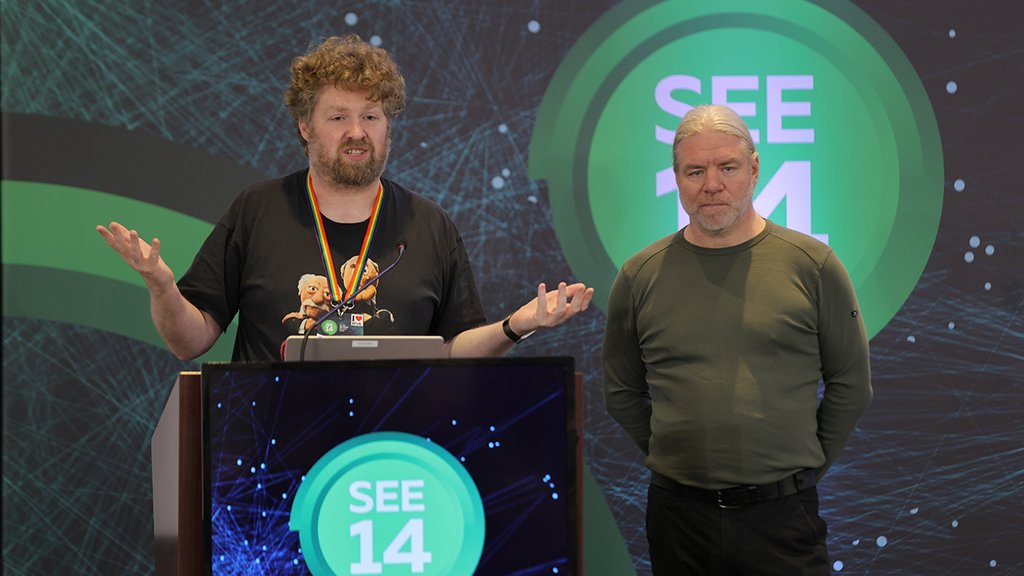A picture of Sander Steffann, Jan Zorz giving a presentation